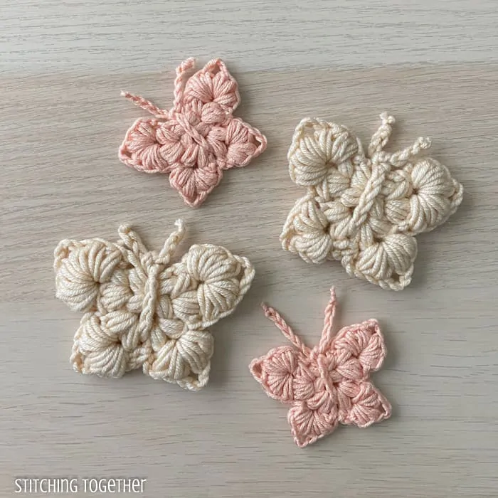 4 crochet butterflies in neutral colors