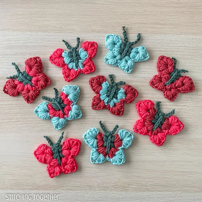colorful butterflies that are crocheted