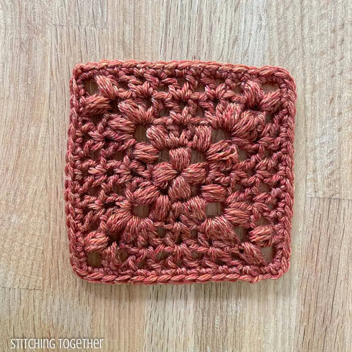 terracotta granny square crochet with open stitches