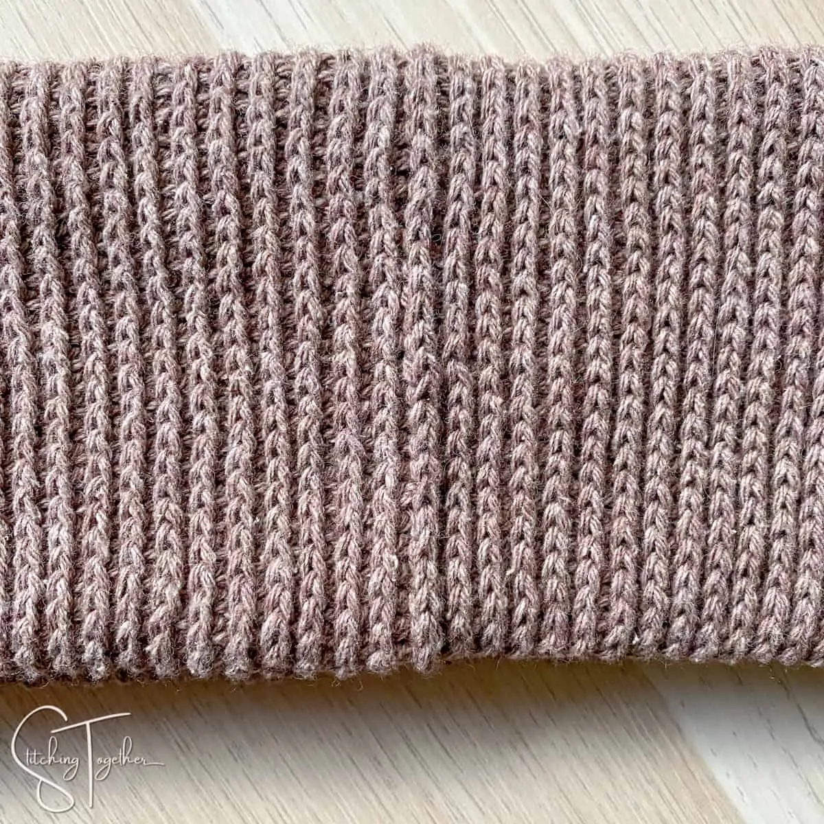 brown crochet fabric with a slightly obvious join