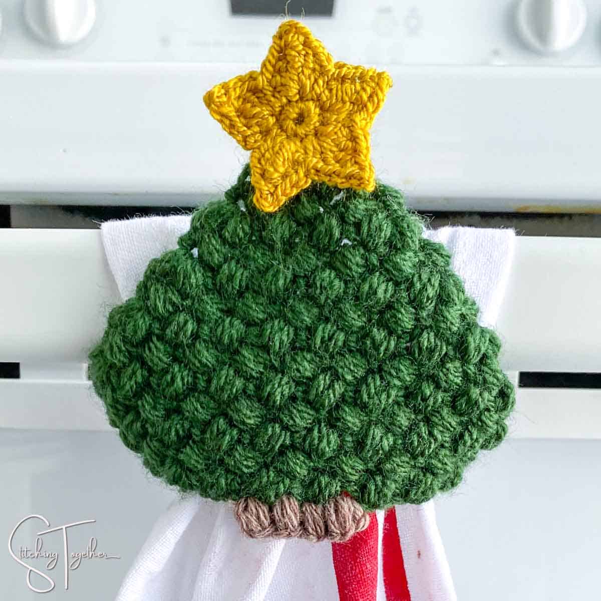 crochet tree with star hanging dishtowel