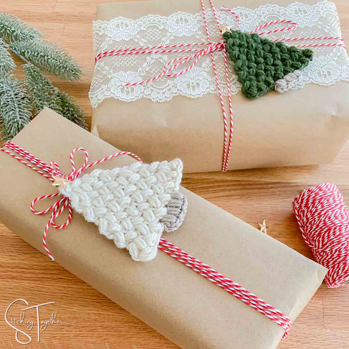 wrapped christmas gifts with Christmas Trees crocheted on the top