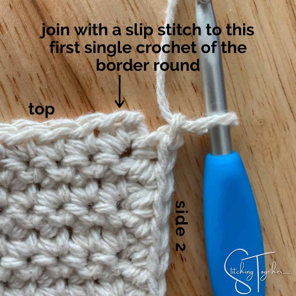 close up of corner of crochet showing where to place border stitches