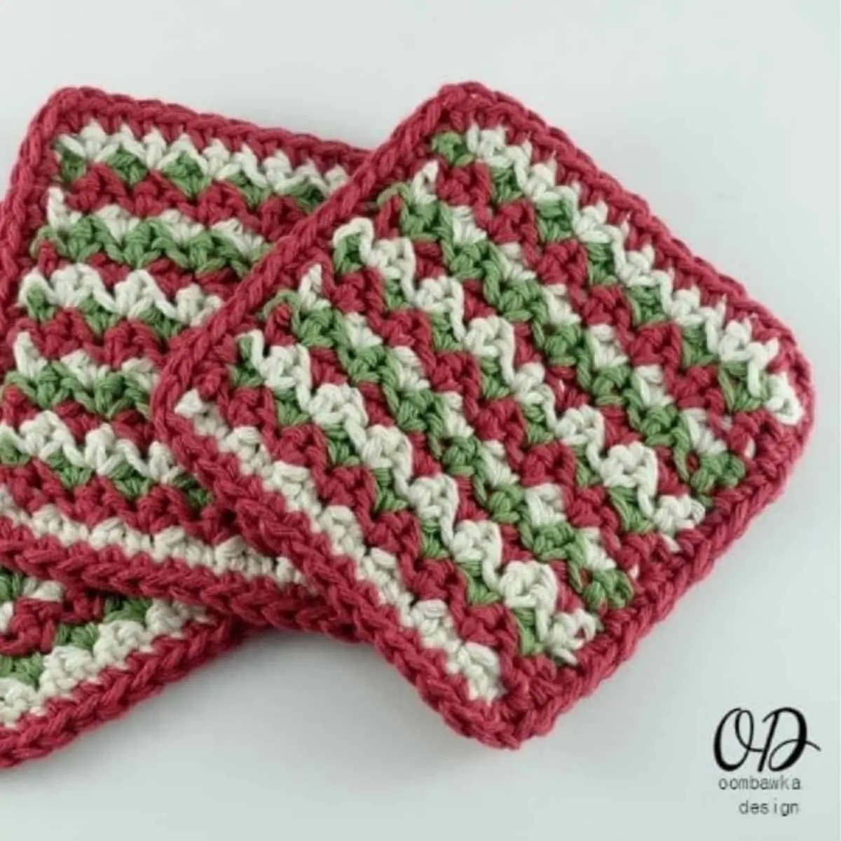 striped green, white, and red coasters crocheted