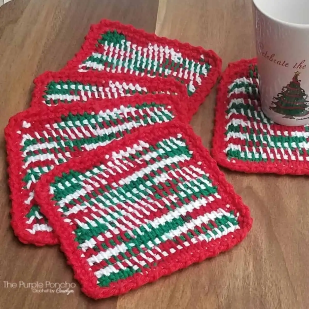 striped green red and white crochet coasters with a coffee mug on one coaster