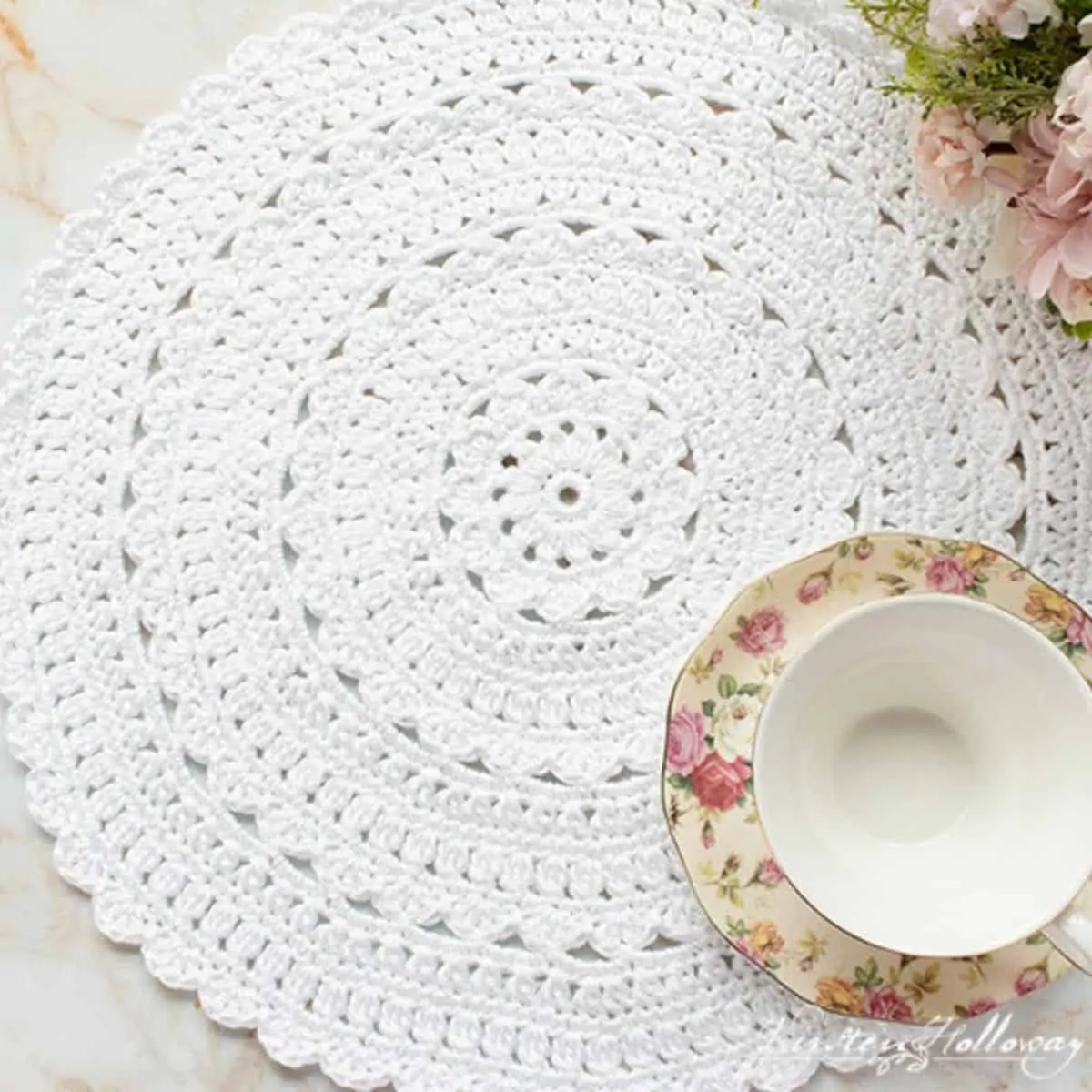 gorgeous white placemat with tea cup sitting on top