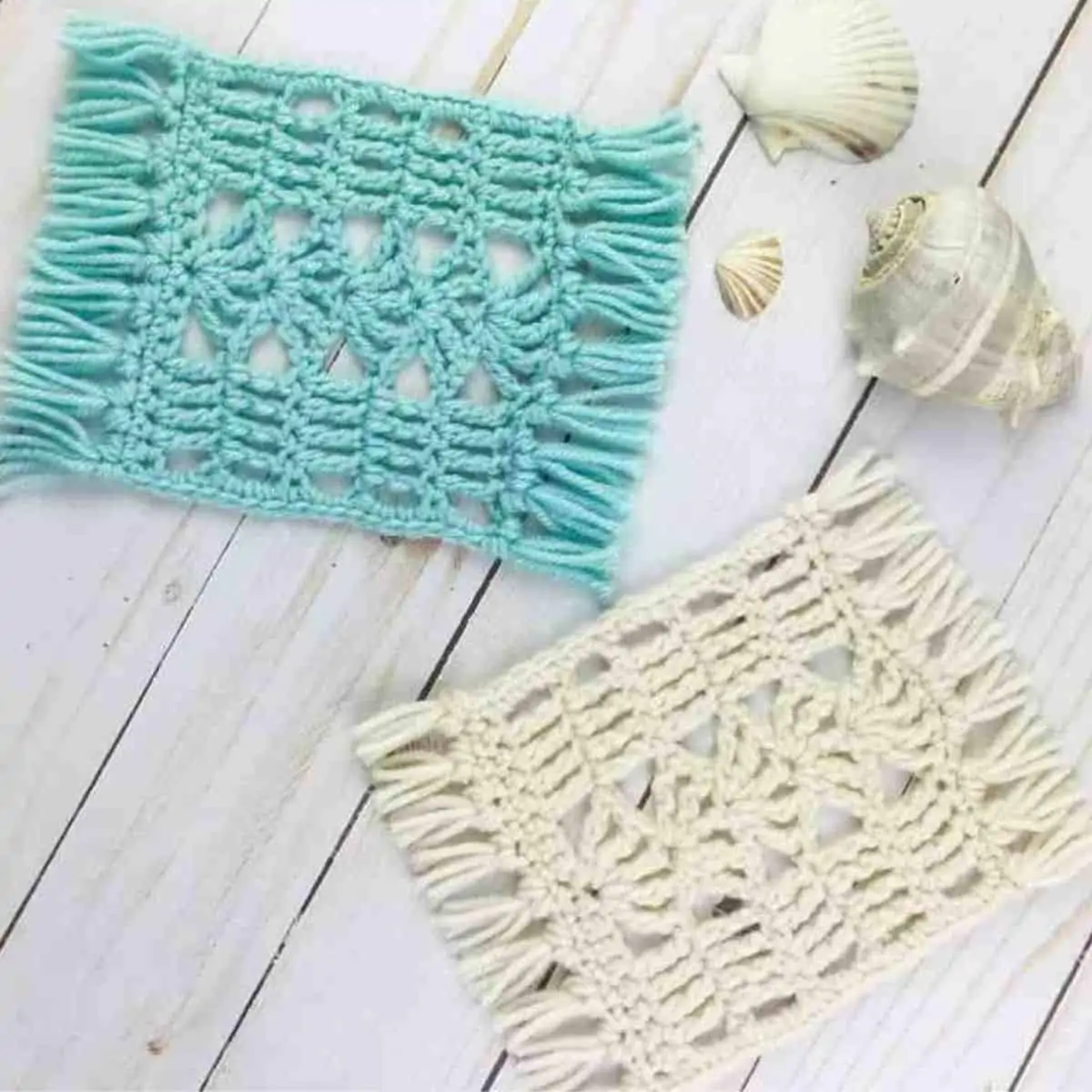 beachy and lacy coasters crocheted next to seashells