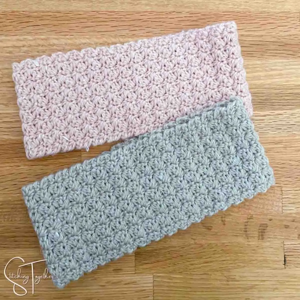2 textured crochet headbands laying flat