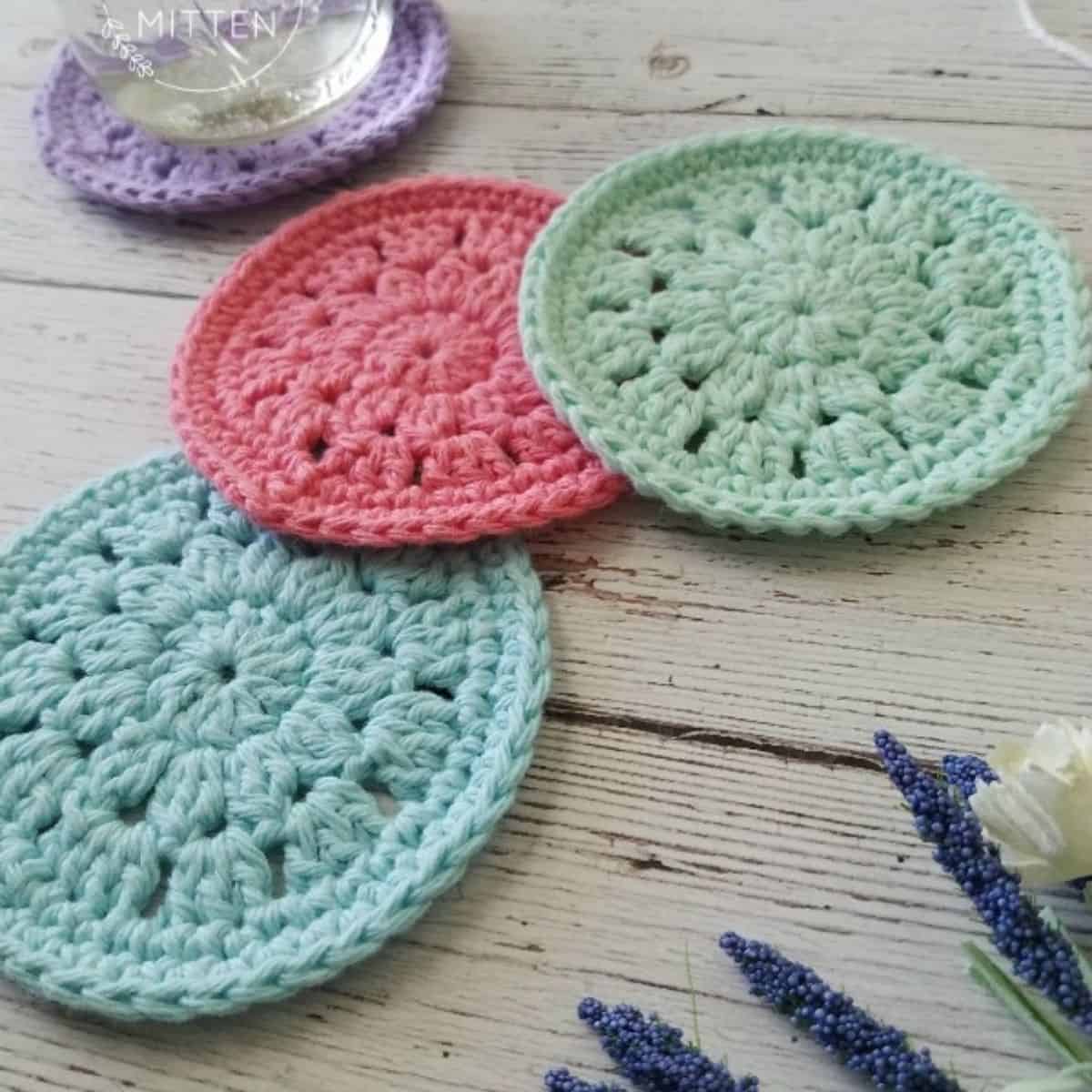 round coasters crochet with a floral motif in the center
