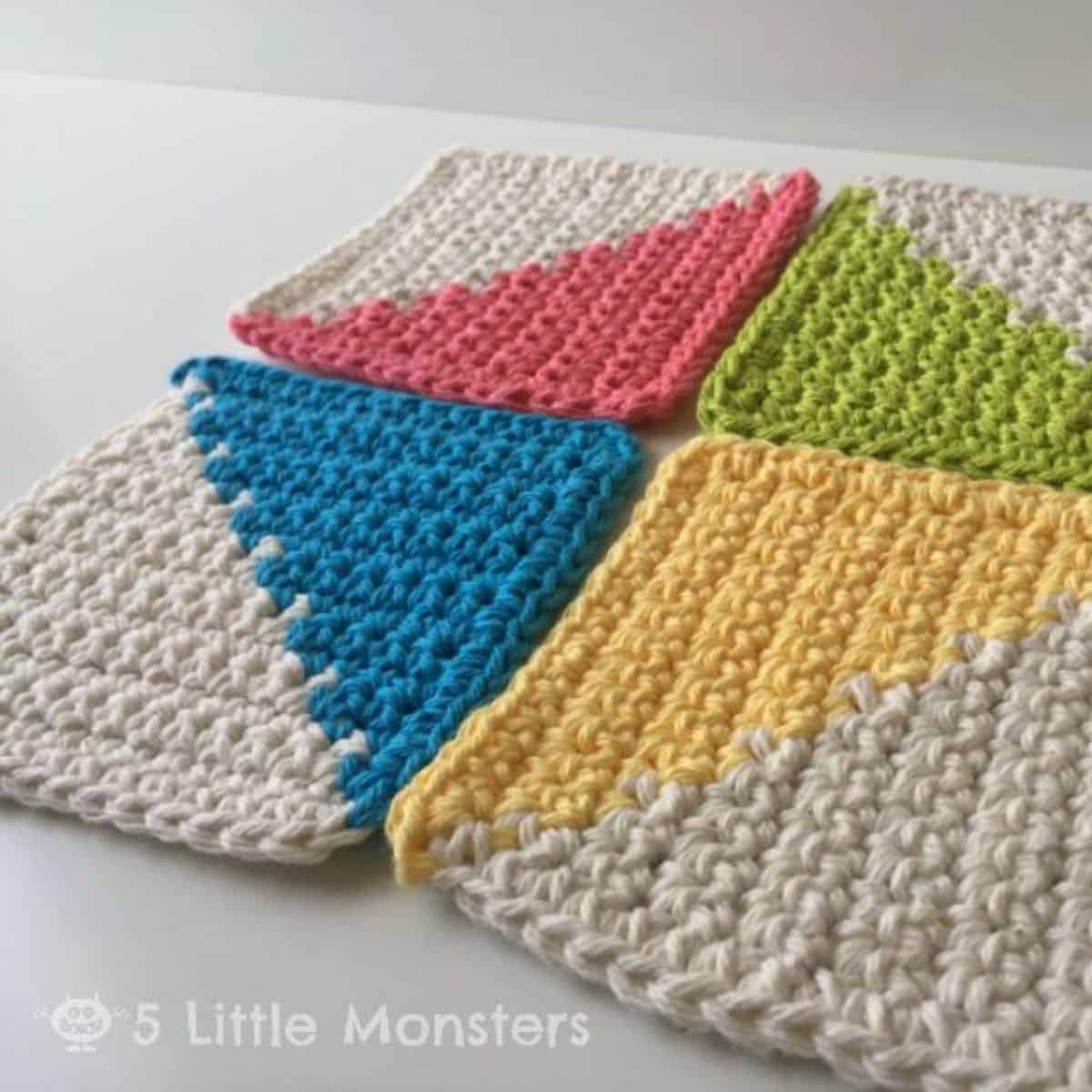 4 crocheted coasters with half of each coaster using colorful yarn and half using neutral yarn