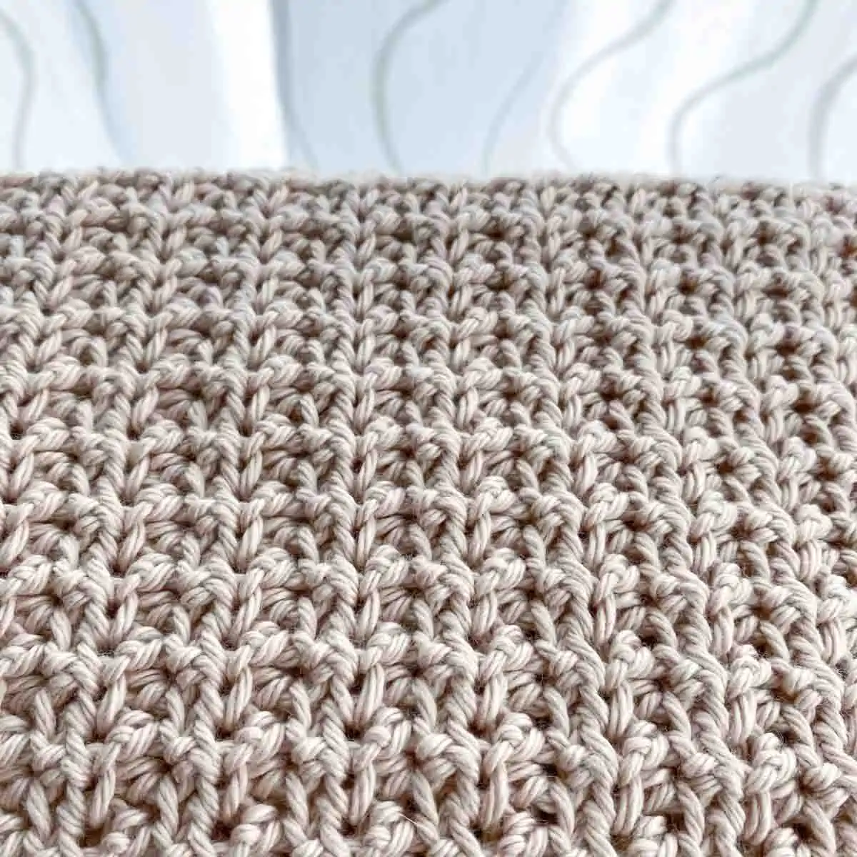 https://www.stitching-together.com/wp-content/uploads/2022/04/easy-crochet-hand-towel.webp