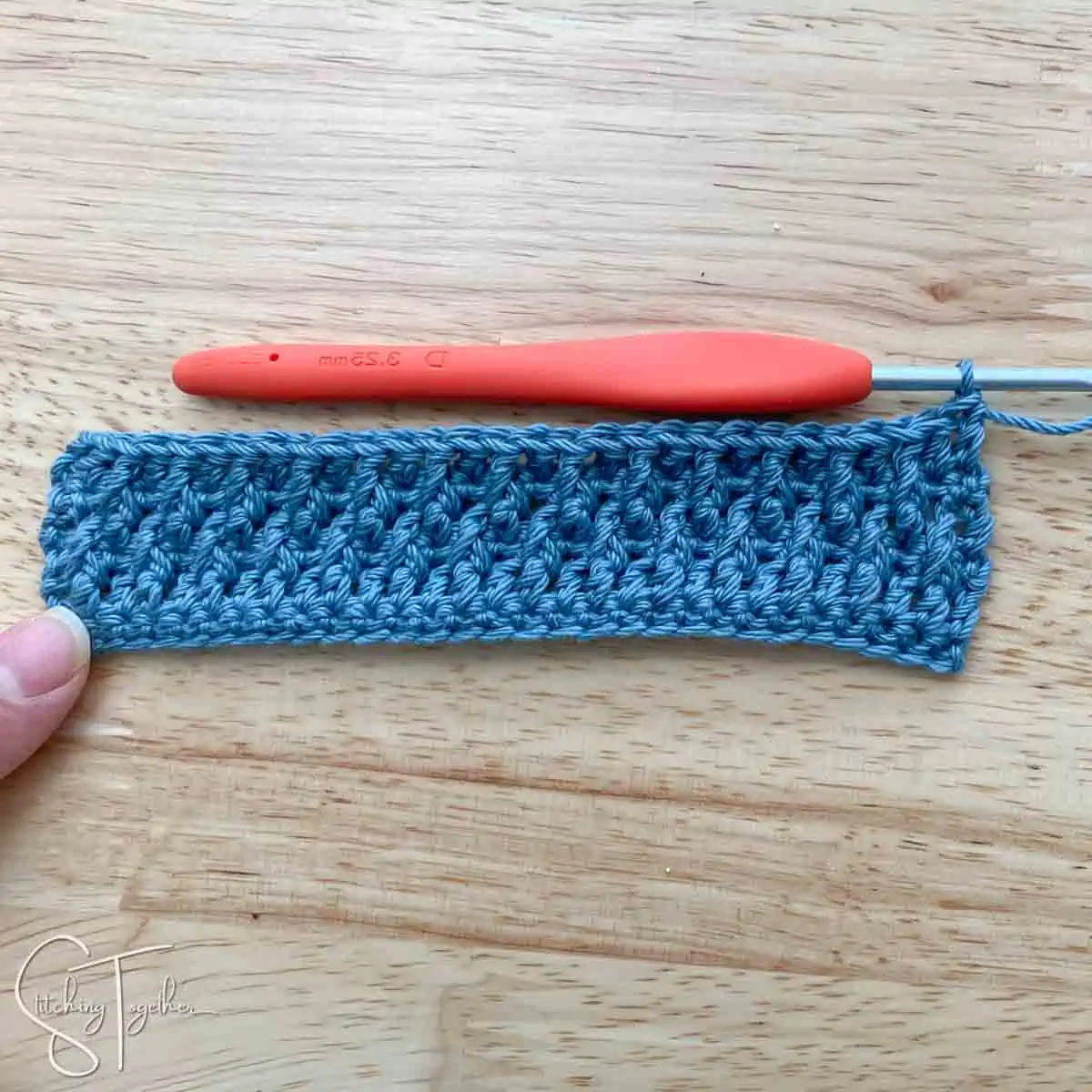 Alpine stitch crochet swatch with rows 1-6 completed left handed