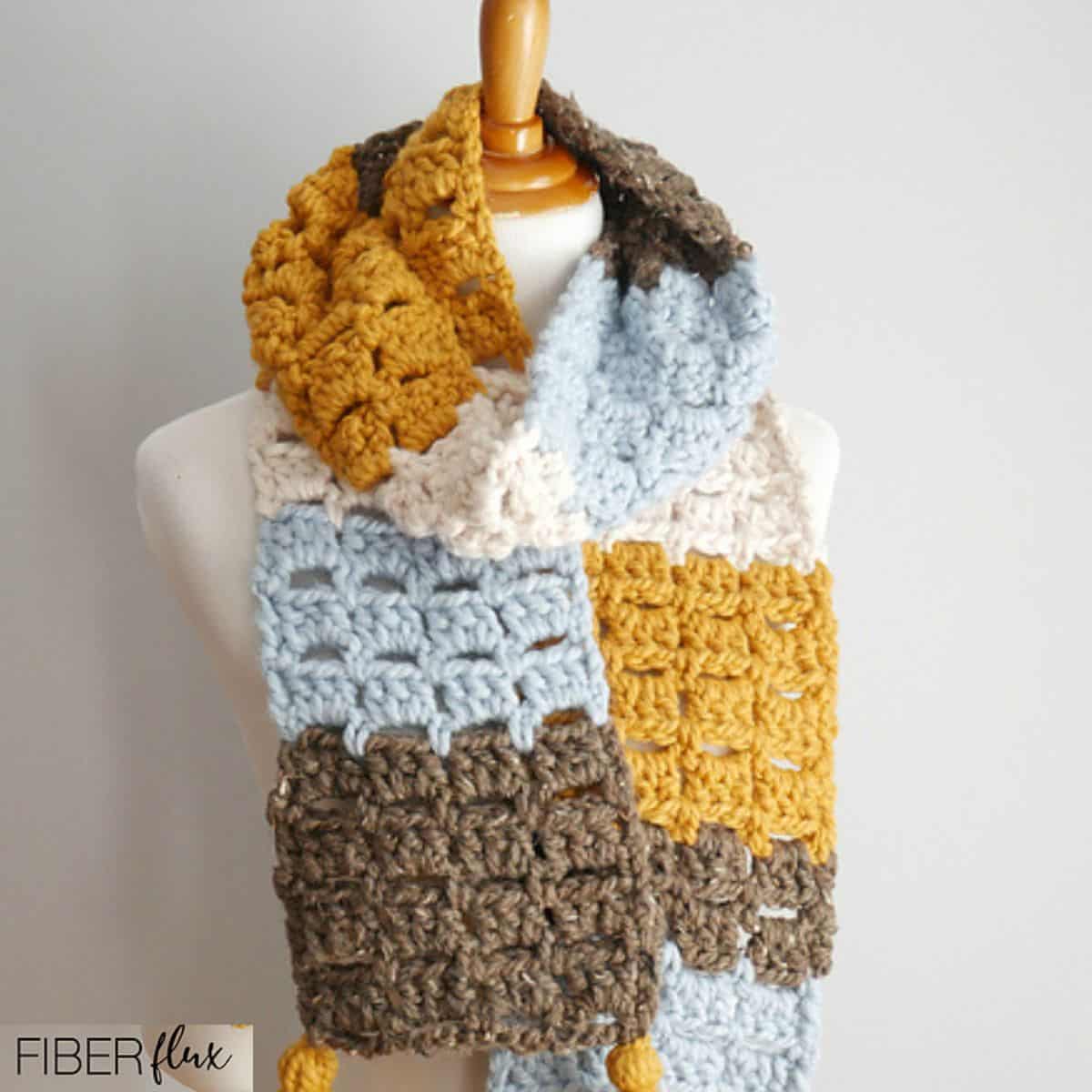block stitch scarf crochet displayed on a mannequin
