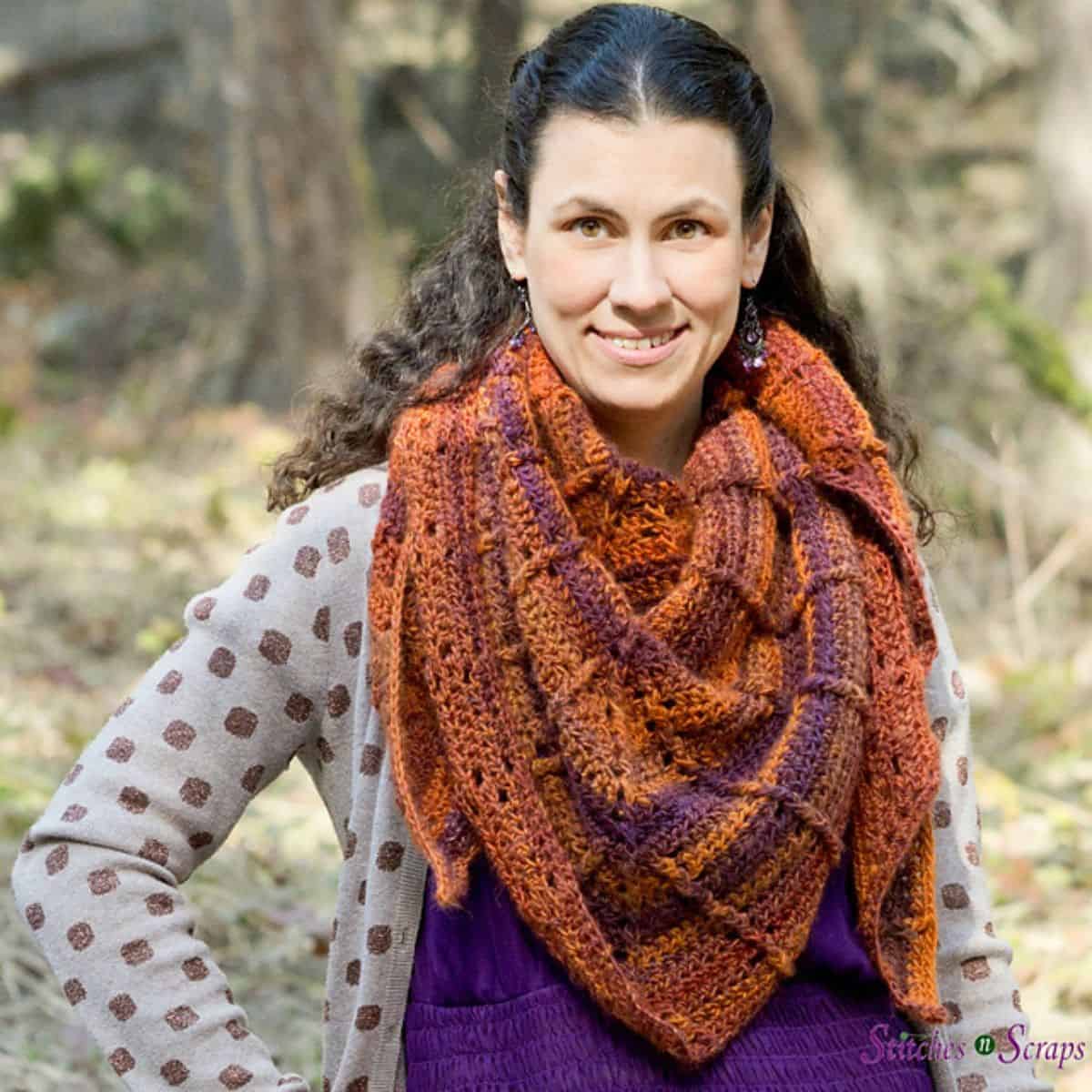 fall crochet triangle scarf on a woman