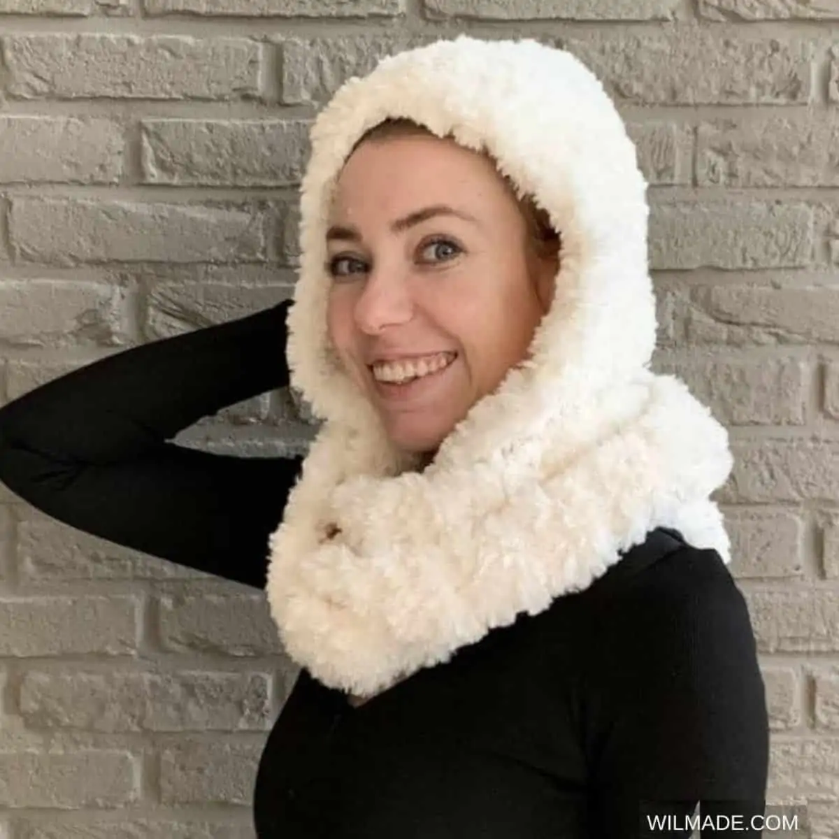 lady wearing a scarf with a hood