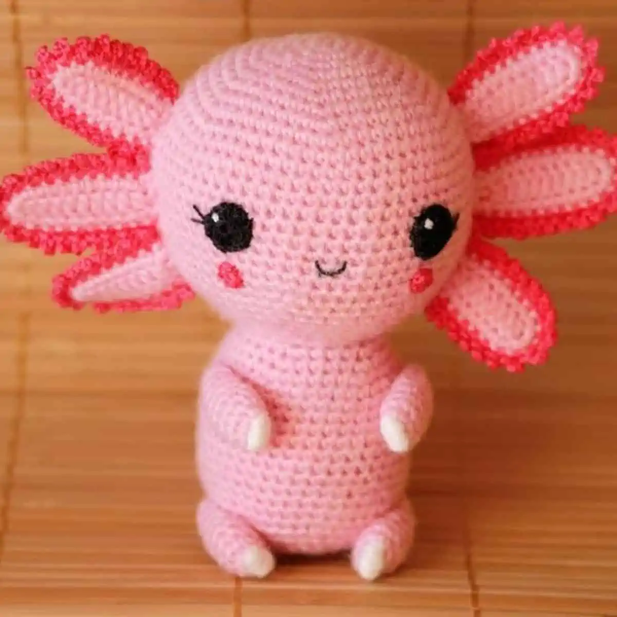 sitting axolotl crochet plush