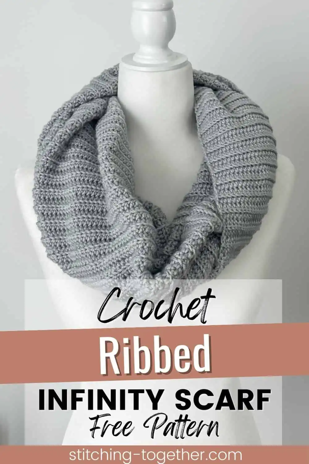 graphic reading "crochet ribbed infinity scarf free pattern' with an image of a gray crochet infinity scarf on the neck of a mannequin