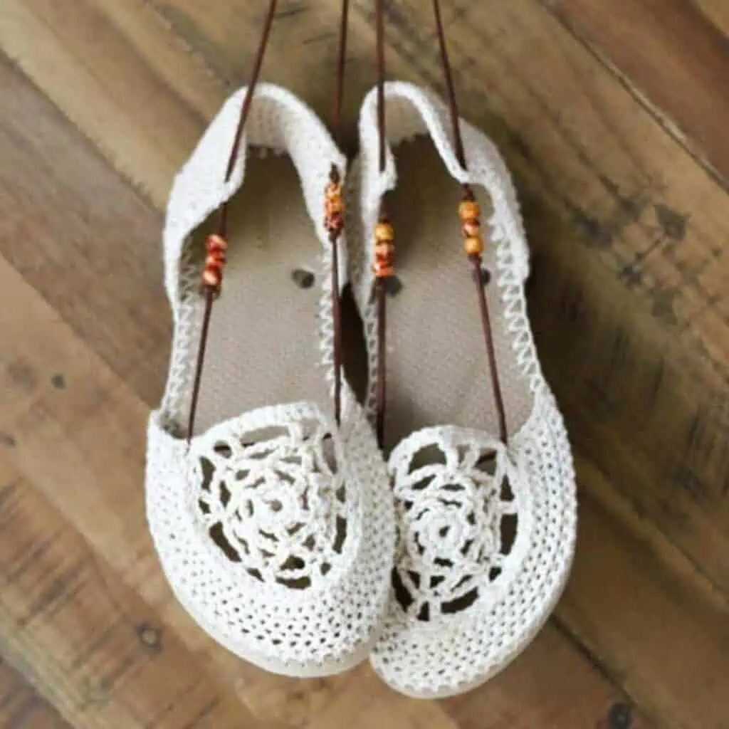 a pair of crochet sandals
