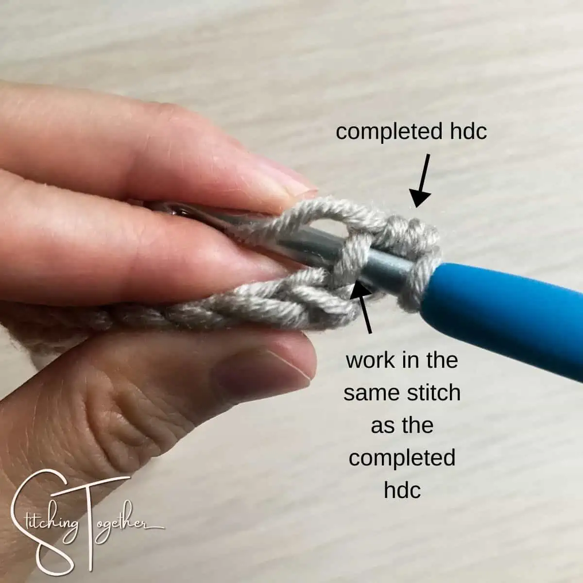 text instructions on how to work a modified half double crochet while showing the stitch