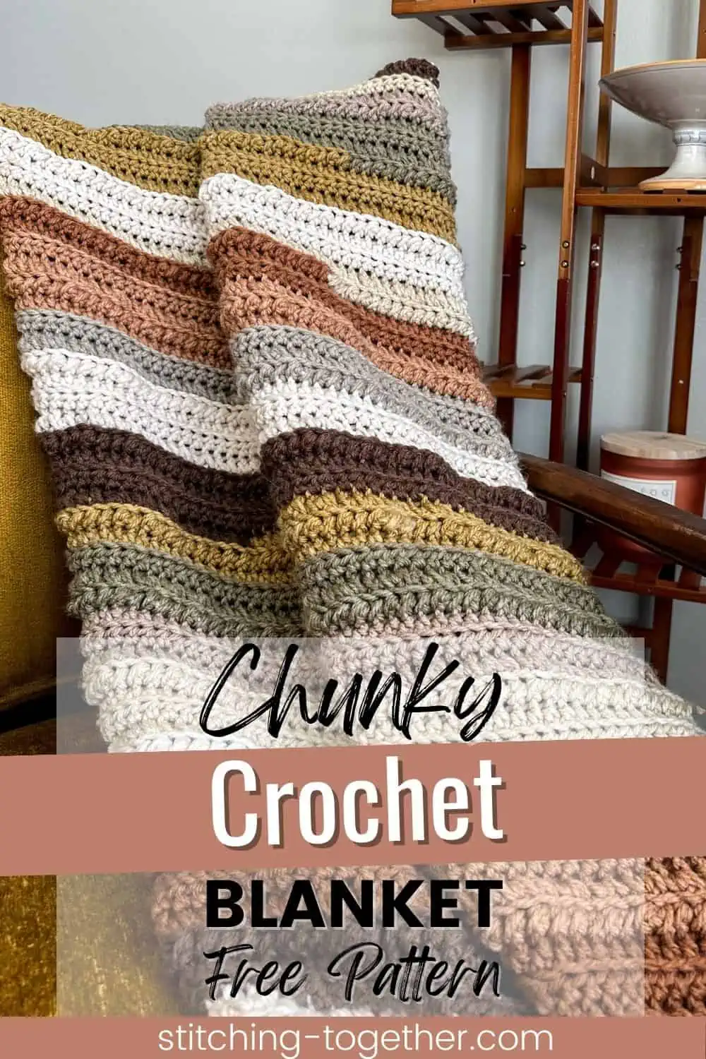 striped crochet blanket draped on a chair with text overlay reading "chunky crochet  blanket free pattern"