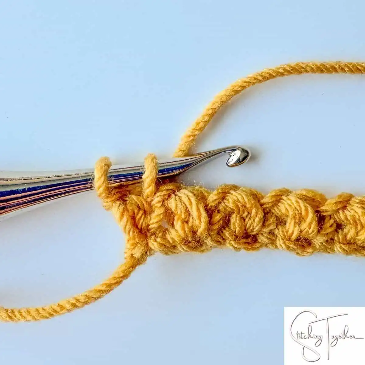 step 10 of the mini bean stitch