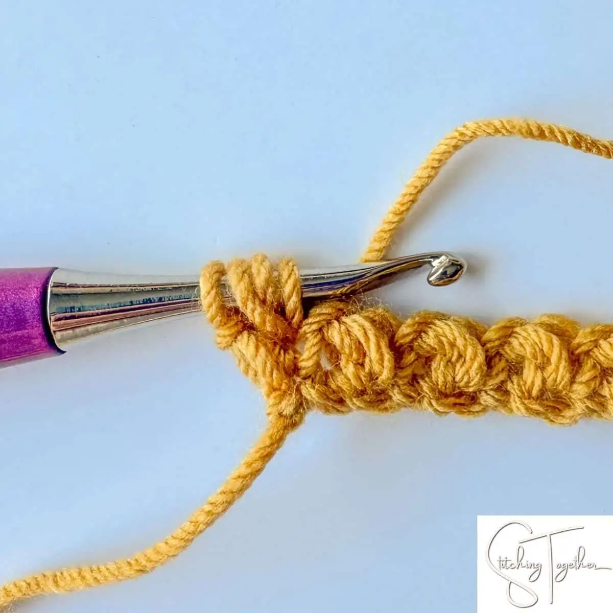 step 11 of the mini bean stitch