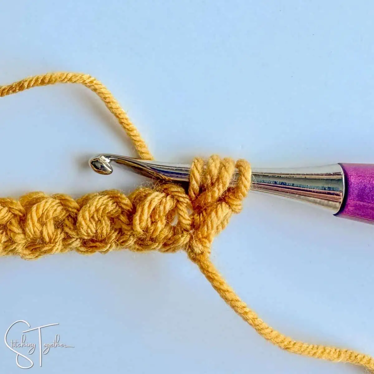 step 11 of the mini bean stitch