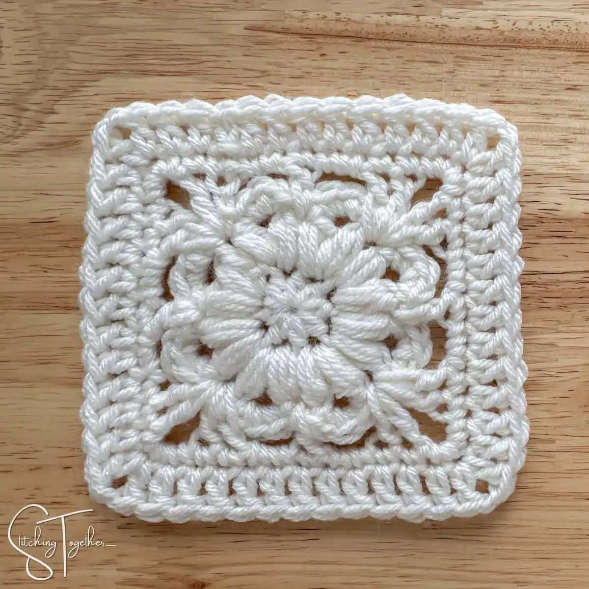 close up of a crochet square motif