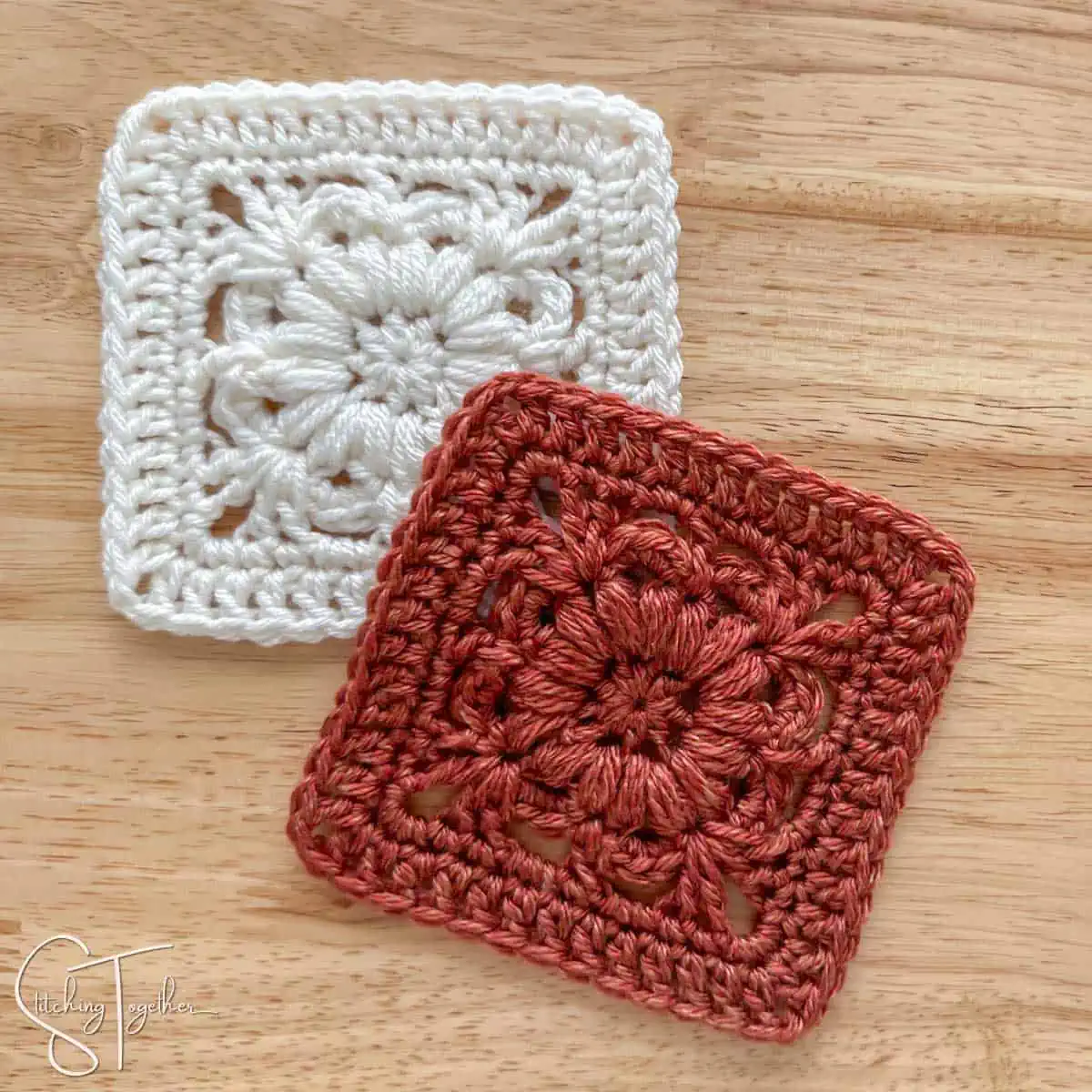 two crochet squares laying flat with one on top of the other