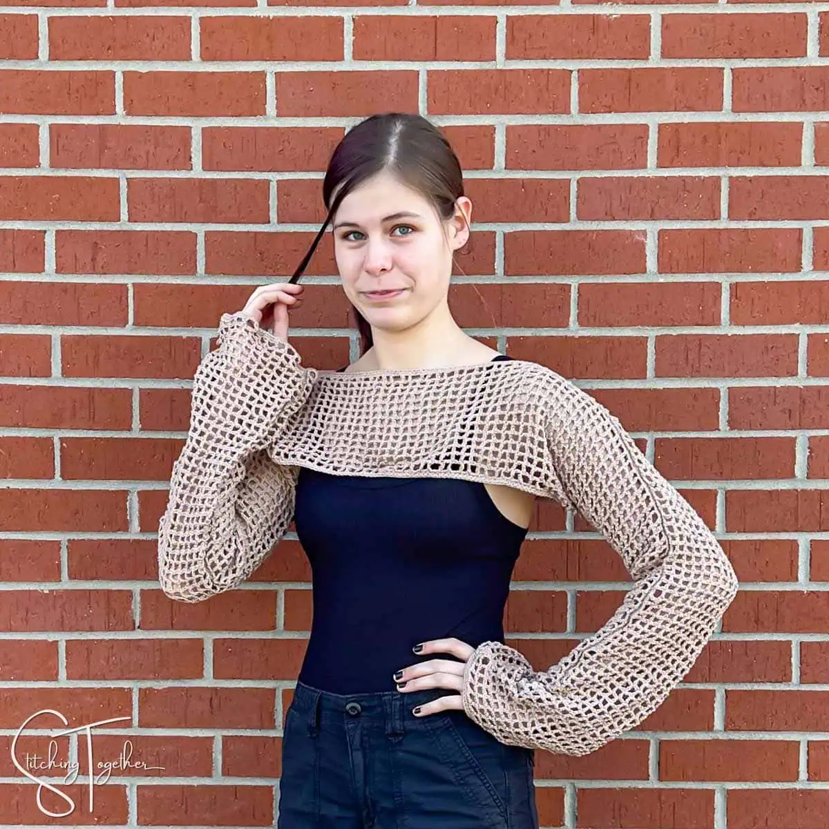 teen wearing a mesh crochet crop top