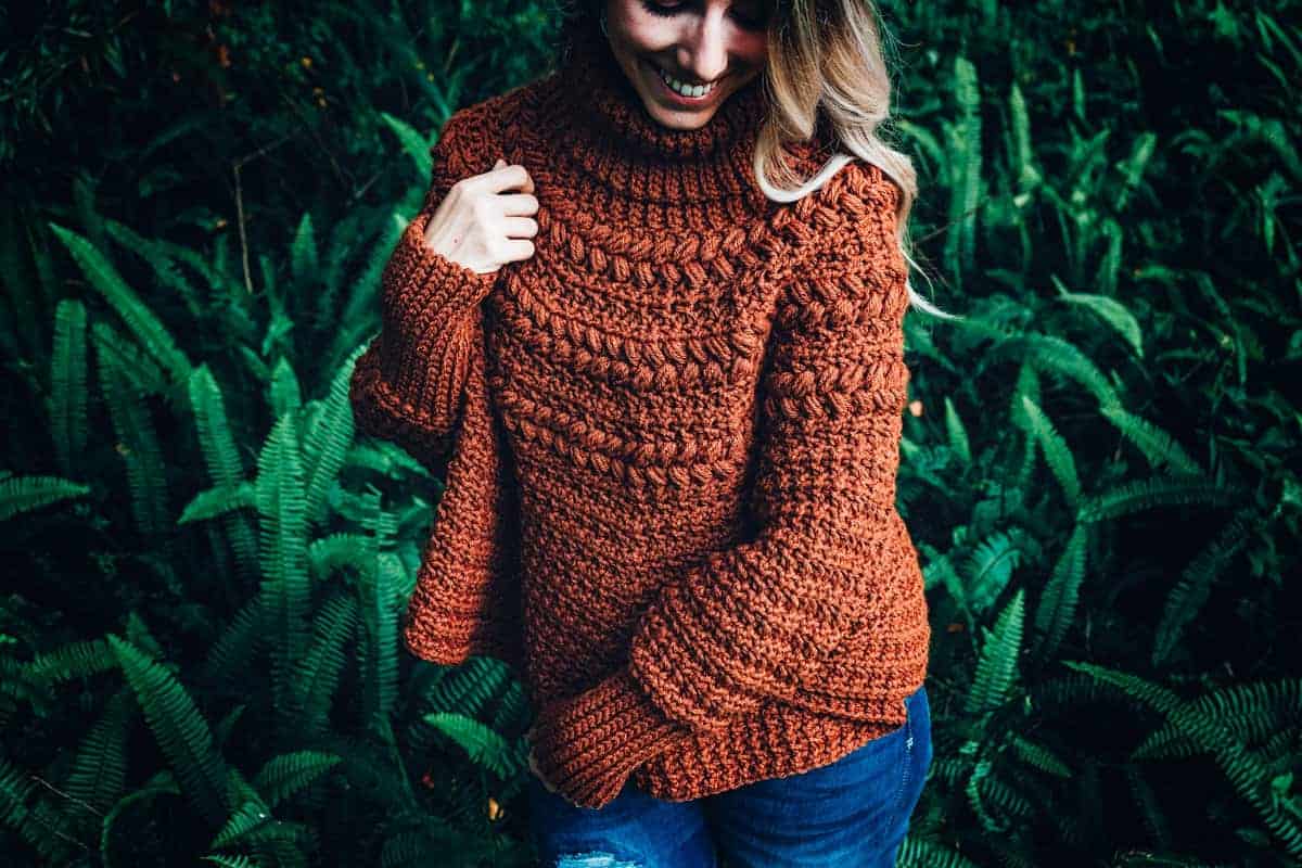lady wearing a crochet poncho