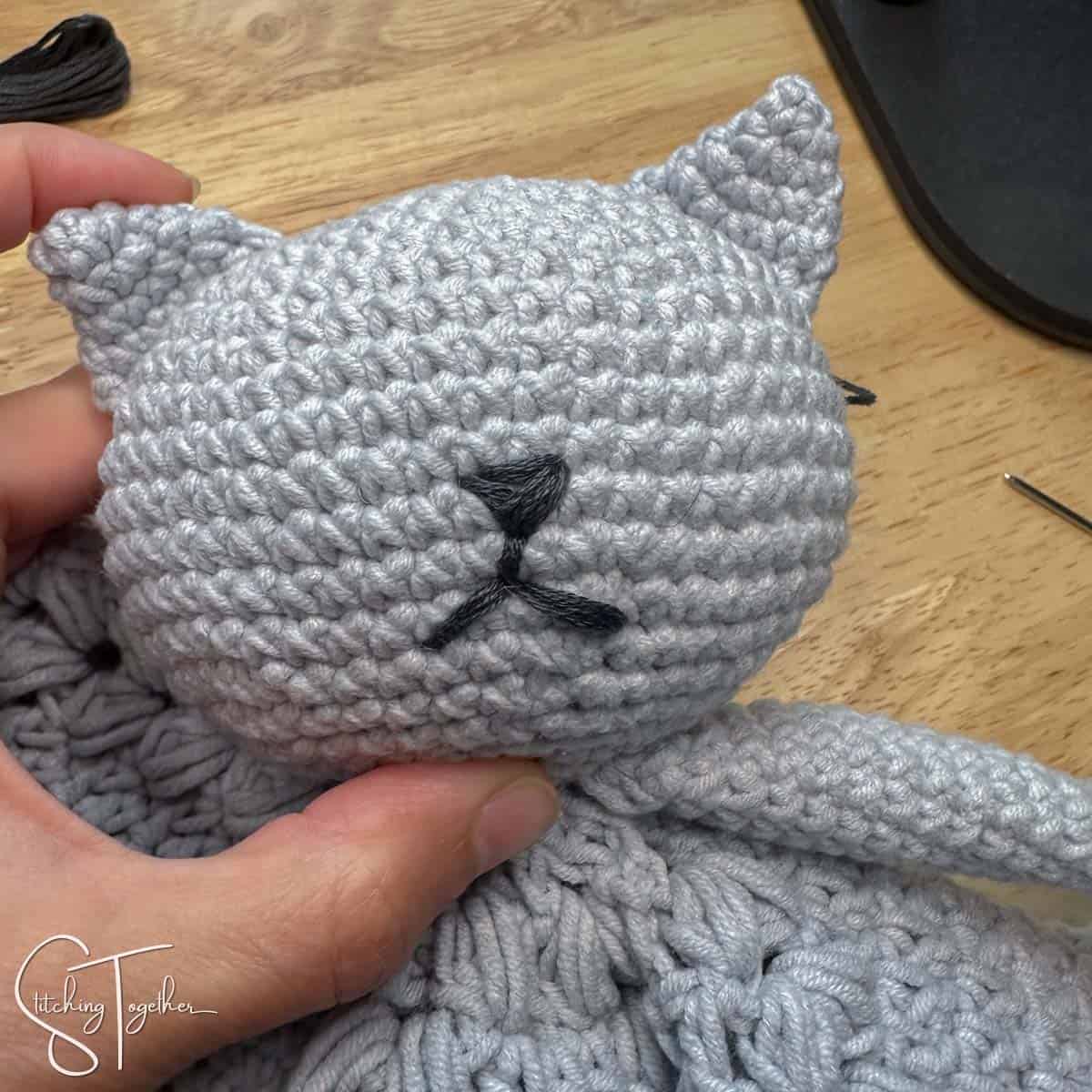 nose and mouth added to crochet cat