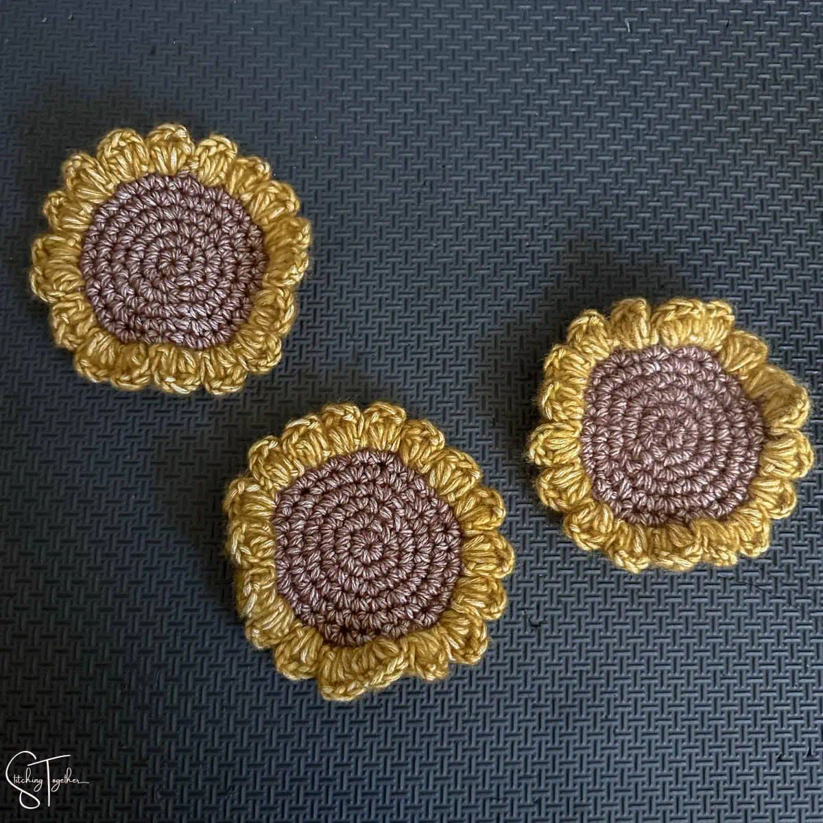 3 crochet sunflowers before blocking