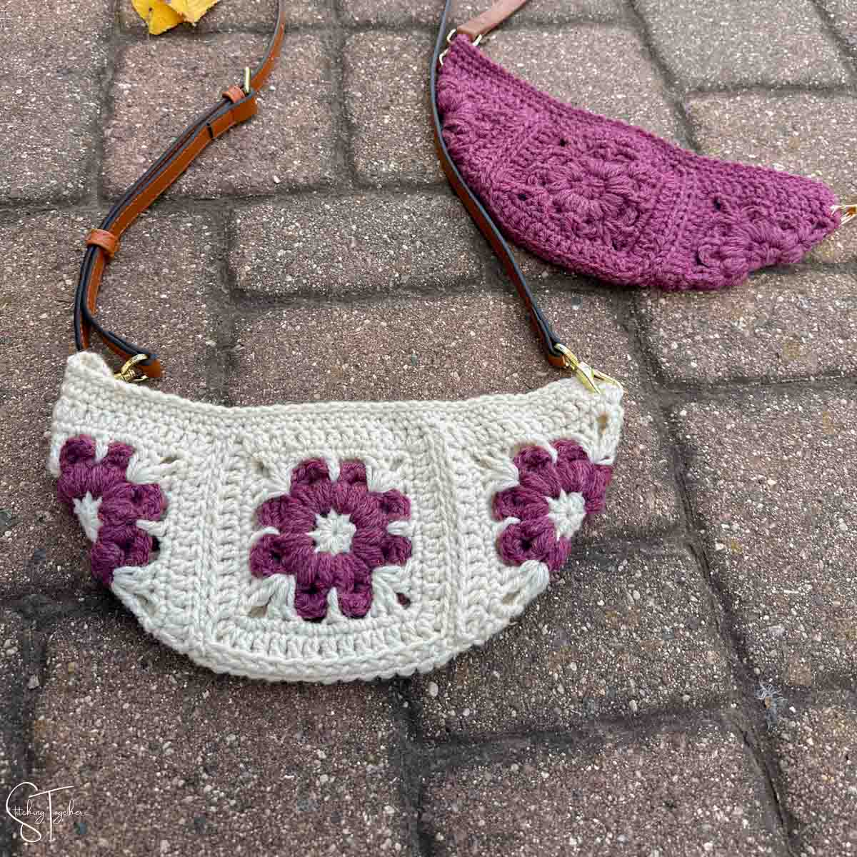 granny square crochet purses laying on the ground
