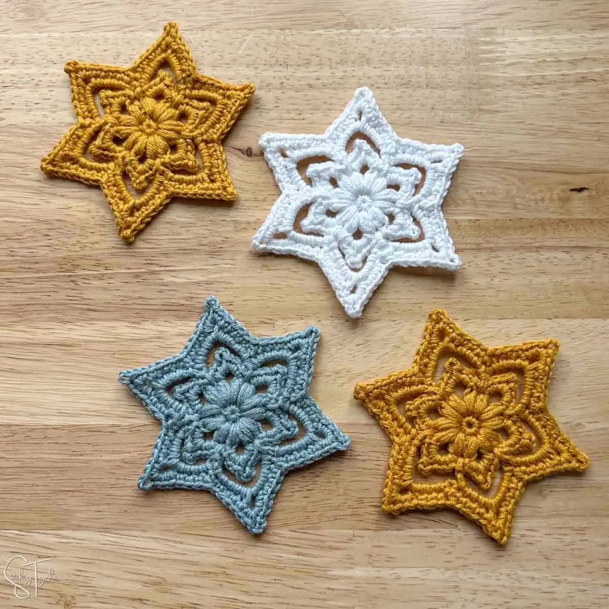 4 crochet stars laying flat
