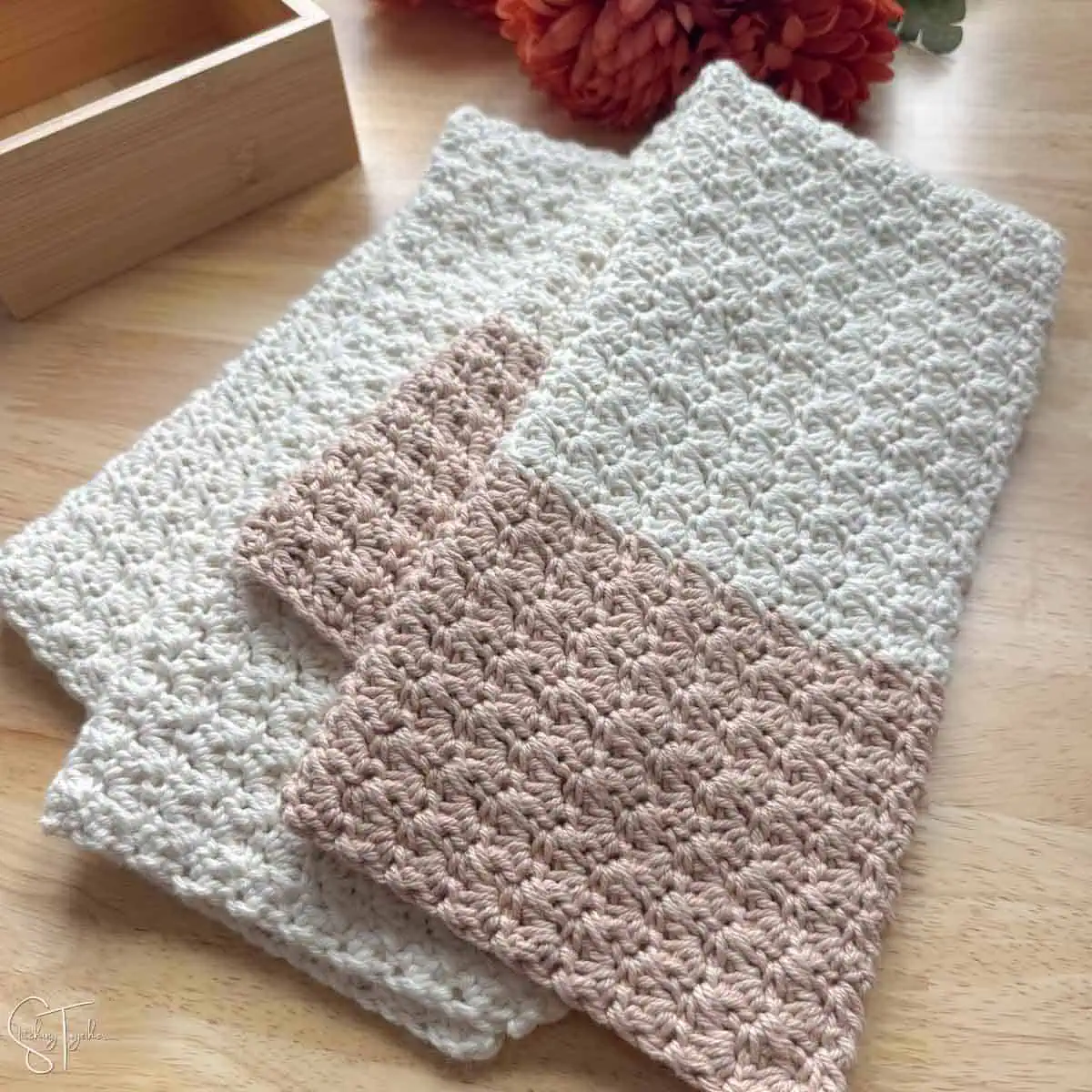 2 folded crochet dish towels