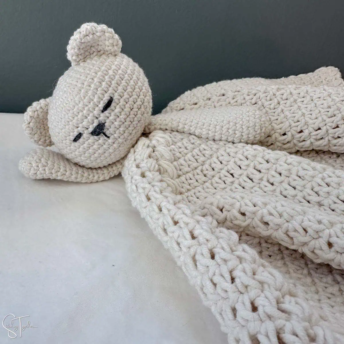 bear lovey crochet laying down