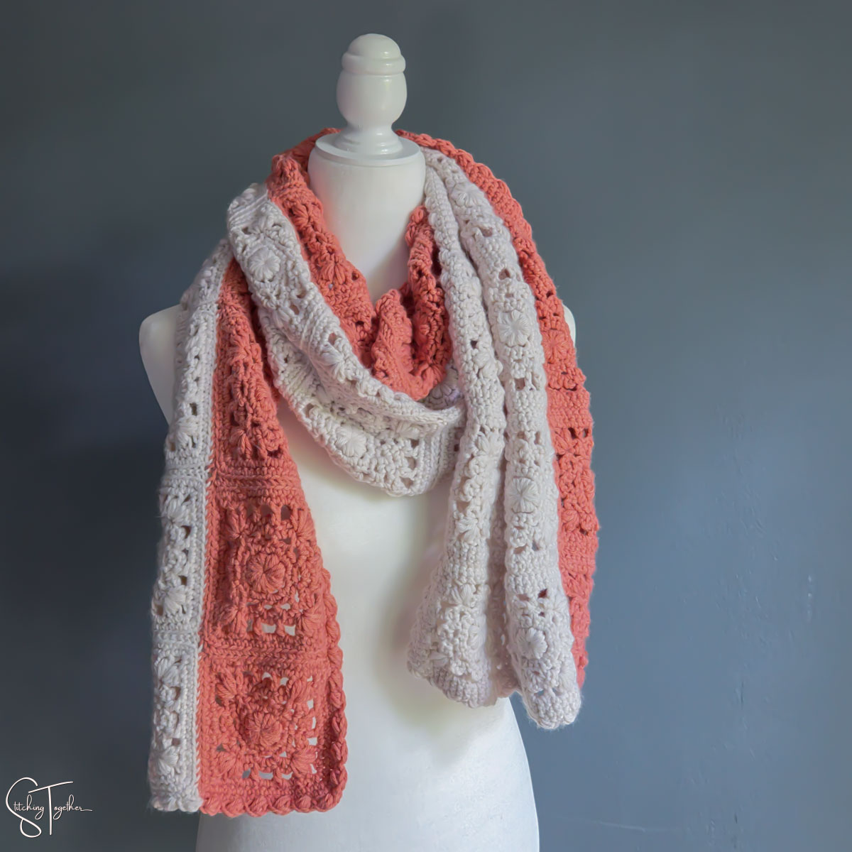 2 color crochet scarf on a mannequin