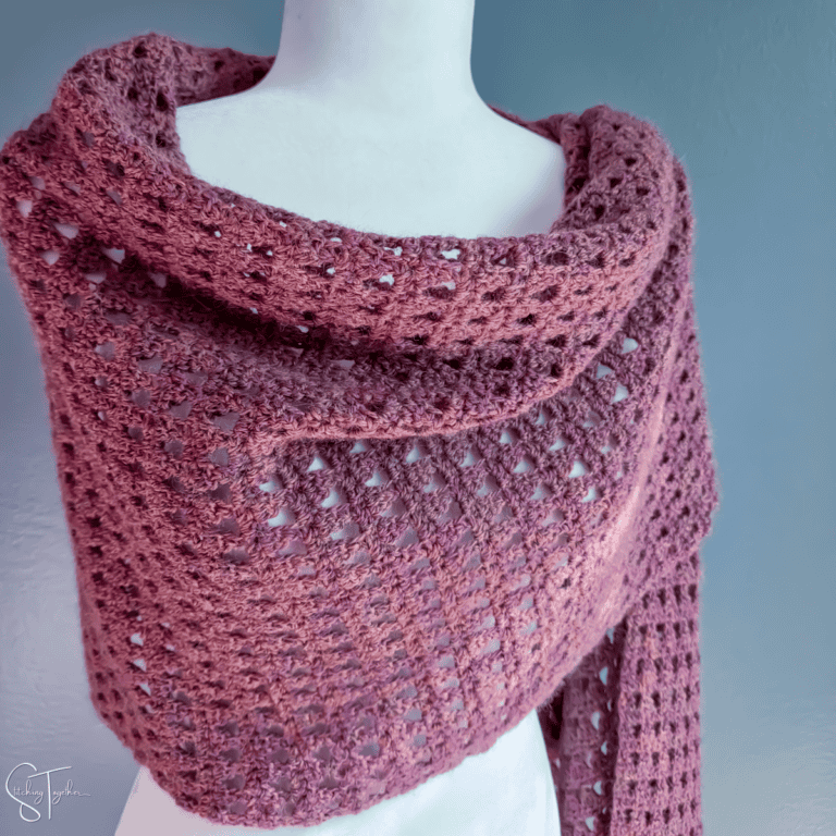 crochet wrap shawl around a mannequin